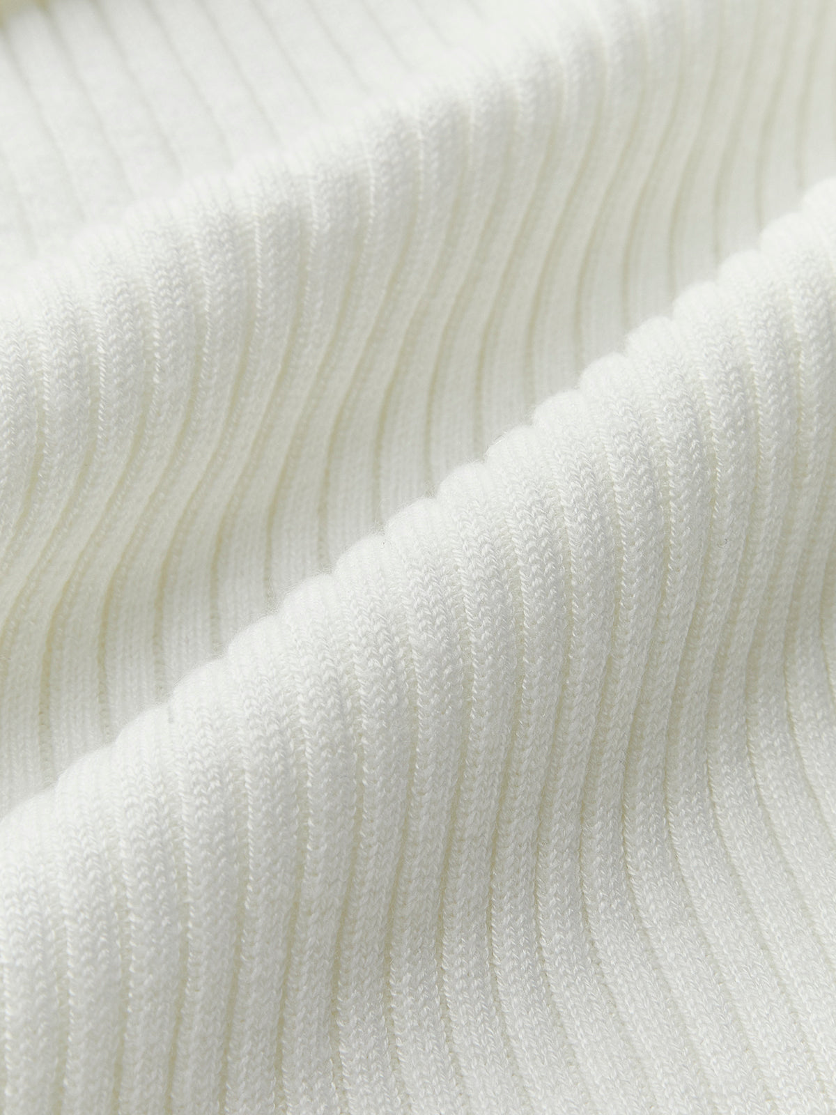 Ribbed Knit Crew Neck Top with Asymmetric Hem